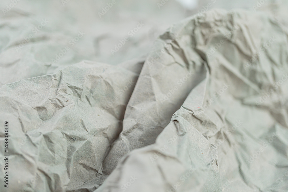 Obraz premium Close-up of textured, creased fabric with an aged appearance, suitable for marketing materials to evoke warmth, comfort, or history