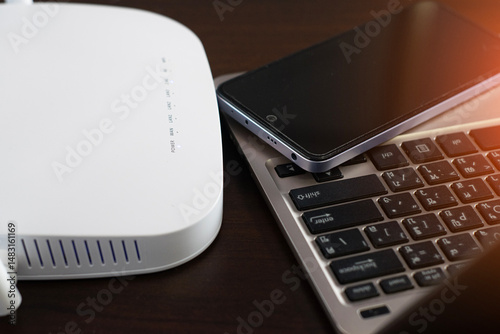 White router connects to Wi-Fi and 5G networks, connects to mobile phones and laptops.