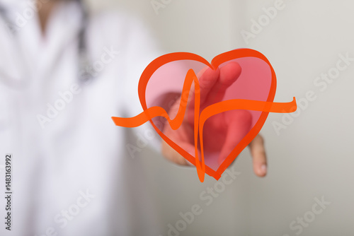 Image of a doctor holding a...