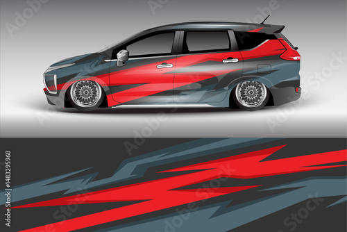 Sleek modified car with vibrant graphics in urban setting