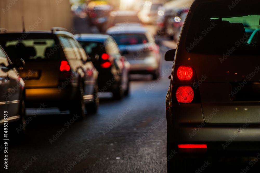 Traffic Congestion at Sunset in a City Tunnel With Vehicles Slowing Down for Rush Hour Traffic Congestion at Sunset in a City Tunnel With Vehicles Slowing Down for Rush Hour