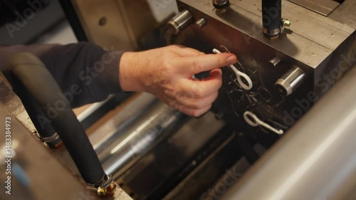 Molds in injection press makes plastic details, molding machine in fabrication facility