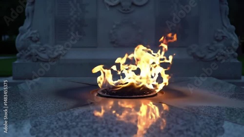 burning candle in the fireplace