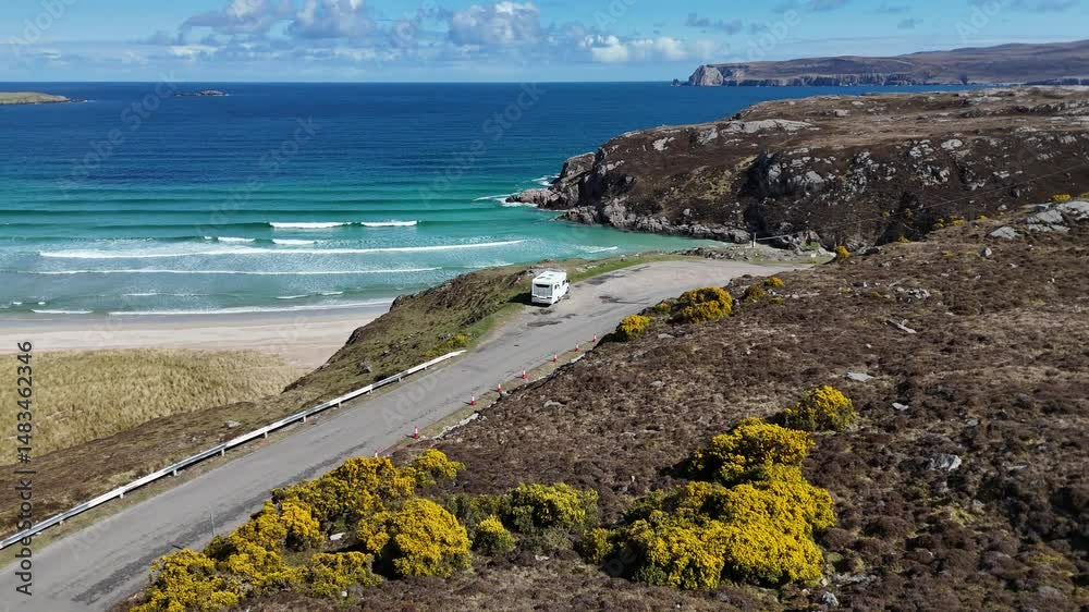 campervan parked on viewpoint overlooking ceannabeinne beach surrounded by rocky cliffs