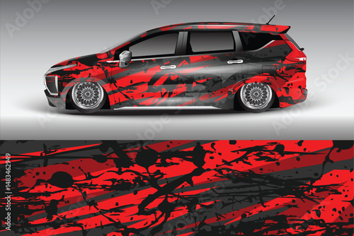 Stylish red and black modified car with abstract design
