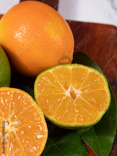 Rangpur, Citrus × limonia or Citrus reticulata × medica, sometimes called the rangpur lime, mandarin lime or lemandarin, is a hybrid between the mandarin orange and the citron.
