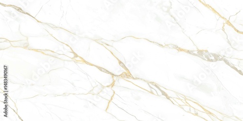 Elegant white marble displays striking gold veins throughout its polished surface creating a luxurious look