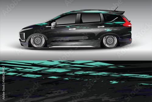 Sleek black car with turquoise design on a gradient background