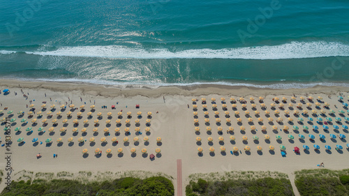Colorful Parasol Pattern on Beach from Above
