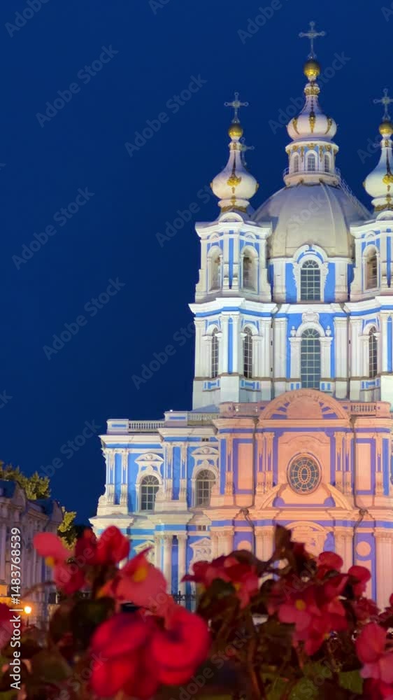SAINT PETERSBURG, RUSSIA - SEPTEMBER 4, 2025: City view of Smolensky Cathedral and the square in the evening. Illumination of the Smolny Cathedral at night. Orthodox church-church. 4K SAINT PETERSBURG, RUSSIA - SEPTEMBER 4, 2025: City view of Smolensky Cathedral and the square in the evening. Illumination of the Smolny Cathedral at night. Orthodox church-church. 4K