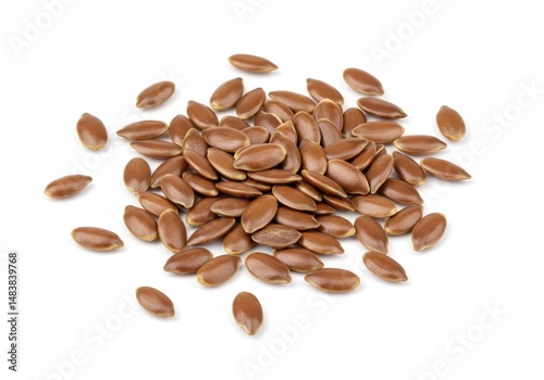 Pile of brown flaxseed or linseed on a white background