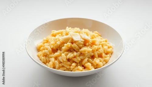 Obraz na płótnie Saffron Risotto alla Milanese Bowl Garnish Isolated on White Background Classic Italian Dish and Cuisine Delicious Meal Yellow Rice and Garnish 3D Render Studio Shot w salonie
