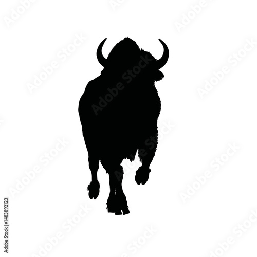 Solid black silhouette of a bison charging