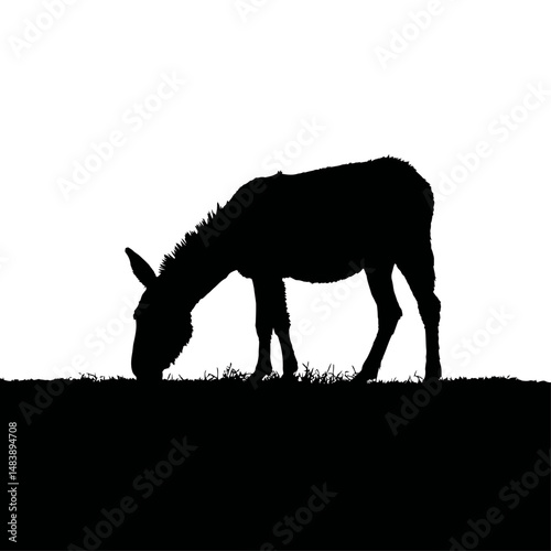 Solid black silhouette of a donkey grazing
