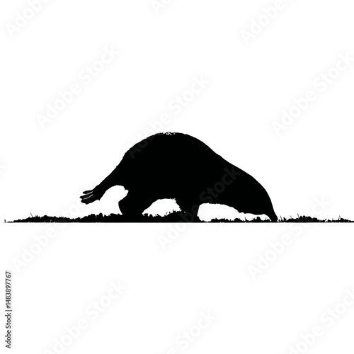 Solid black silhouette of a mole digging