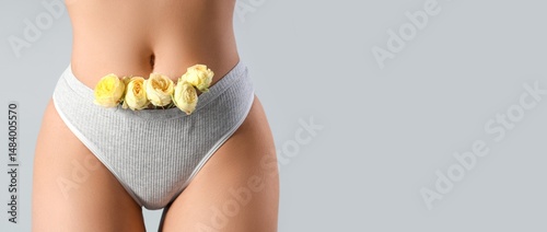 Young woman in panties with...