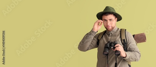 Young male tourist holding ...