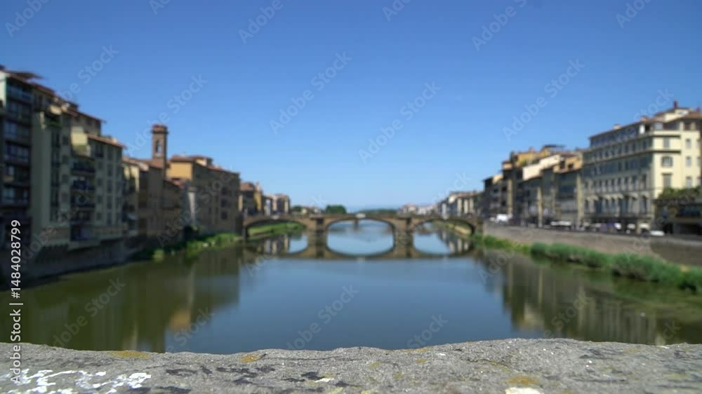 Stunning View of Ponte Vecchio Bridge Over the Arno River in a Clear Blue Sky in Florence Stunning View of Ponte Vecchio Bridge Over the Arno River in a Clear Blue Sky in Florence