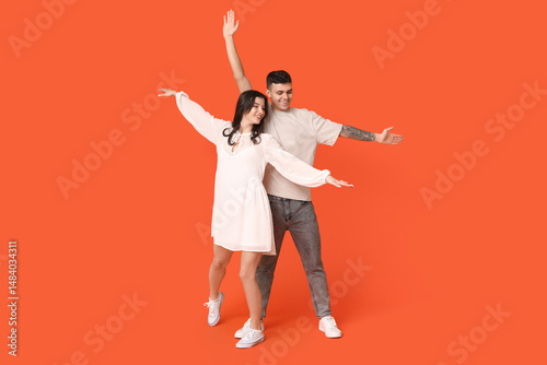 Happy young couple dancing ...