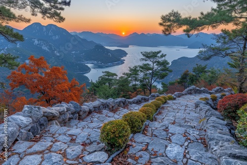 Stunning golden sunset viewpoint at dando port overlooking the ansan sea with yellow sky and clouds