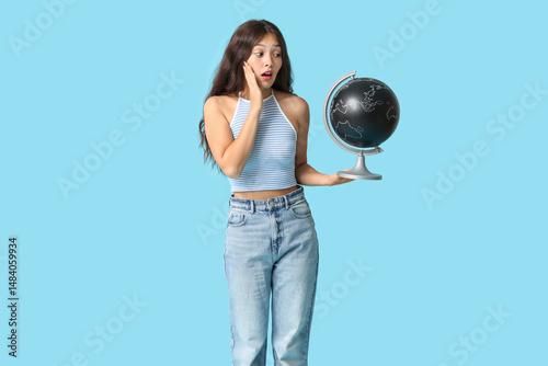 Surprised young Asian woman...