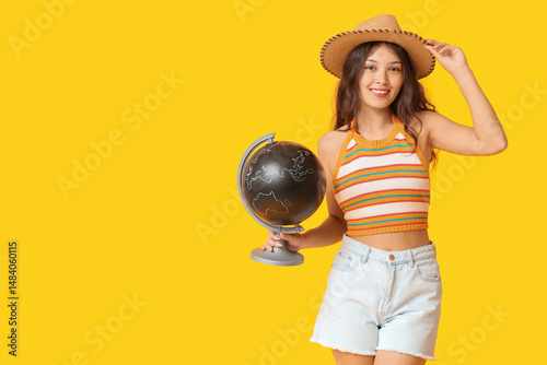 Young Asian woman with glob...