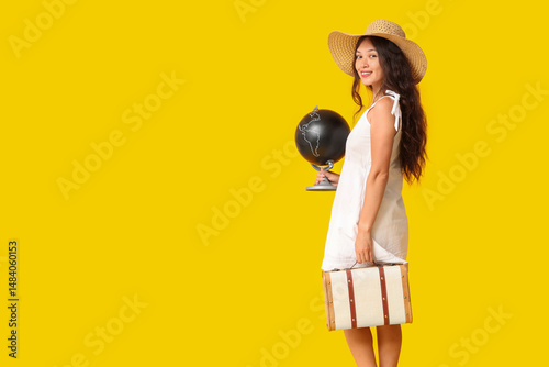 Young Asian woman with glob...