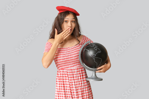 Surprised young woman in re...