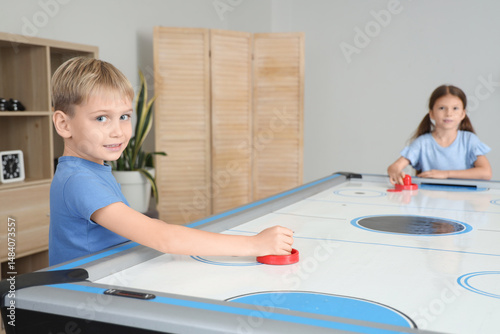 Little boy with girl playin...