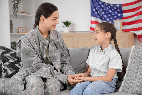 Female military soldier hol...
