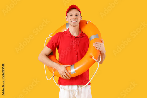 Male lifeguard with rescue ...