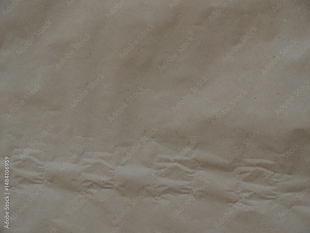 Fototapeta premium Textured Beige Paper Surface with Subtle Creases