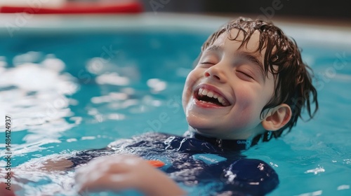 A child with cerebral palsy receiving hydrotherapy, smiling as they move freely --ar 16:9 --v 6.1 Job ID: 2619a8e1-4e2d-4947-bb0c-54a27ba117e3