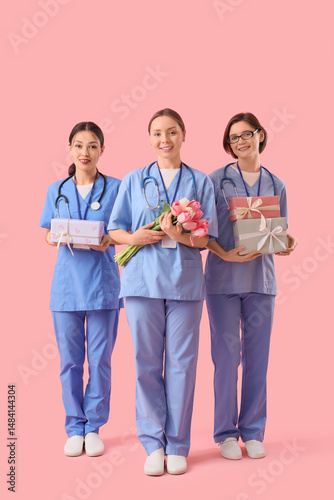 Female doctors with gifts a...