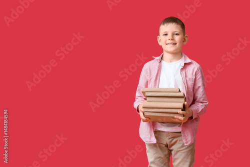 Cute little boy with stack ...