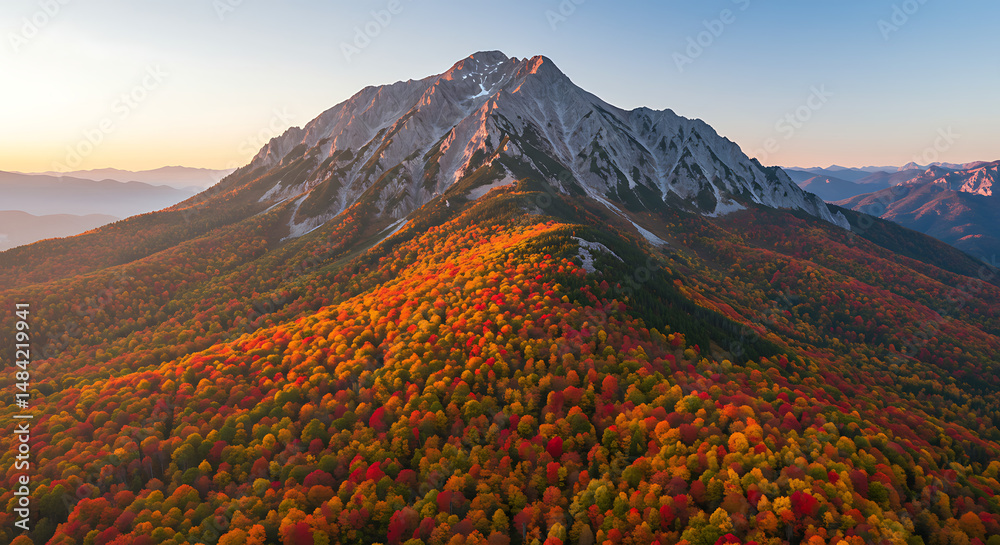 Fototapeta premium Autumnal Majesty of Mountain Slopes with Vibrant Foliage