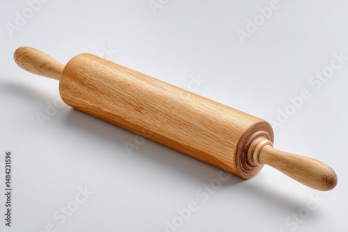 Wooden rolling pin on a light background.
