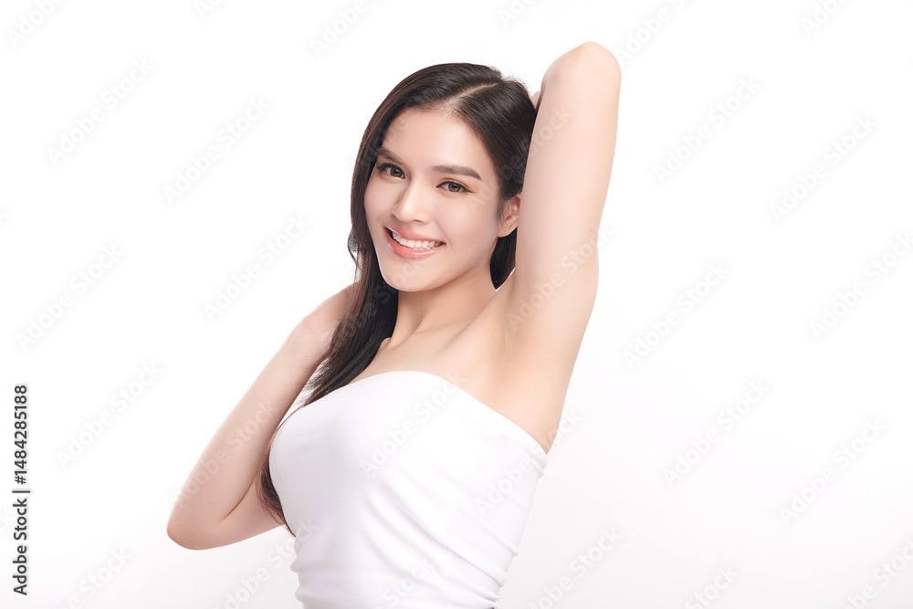 Beautiful Young Asian woman Raises her hands to Showcase clean and hygienic underarms Against a white background, Smooth armpit cleanliness and protection concept Beautiful Young Asian woman Raises her hands to Showcase clean and hygienic underarms Against a white background, Smooth armpit cleanliness and protection concept