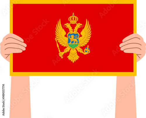 Woman's hand holding the Montenegro flag