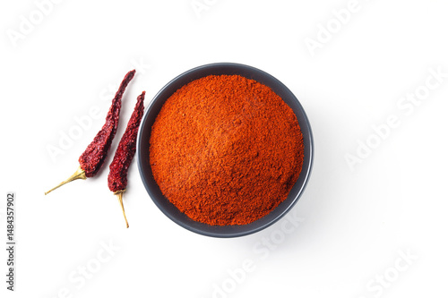 Fototapeta Naklejka Na Ścianę i Meble -  Indian spices called red chilli and chili powder in bowl isolated  on white background top view 