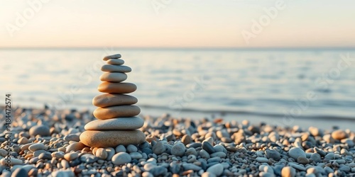 Serene beach pebble tower, balancing stones symbolize inner peace and well-being, beach,  sand