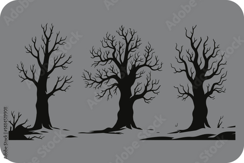 Silhouette of Three Bare Winter Trees on a Gray Background