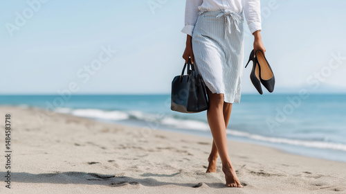 business woman walking on the beach 