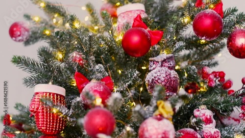 Red Christmas balls on the Christmas tree. Holiday decoration, joy, happiness, family. High quality FullHD footage