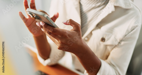 Business woman, hands and typing with phone at desk for browser testing, social media trends or client feedback. Web designer, above or smartphone for app performance, troubleshooting or online news