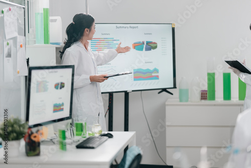 Wallpaper Mural Biofuel innovation using algae in biotechnology laboratory, showcasing scientific extraction of sustainable energy through microbiological research and eco-friendly solutions for the future Torontodigital.ca