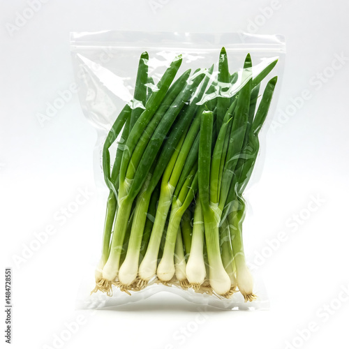 Fresh green onions in a plastic bag ready for cooking or garnishing dishes
