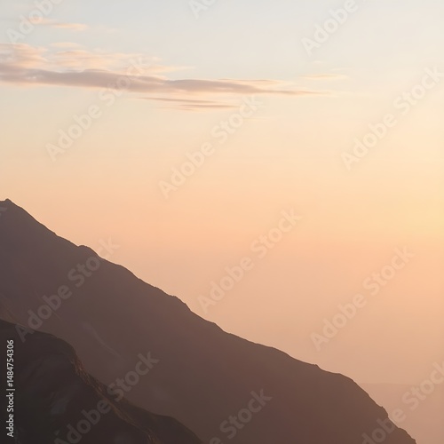 Gentle Sunset in Pastel Tones Over Volcanic Ridgeline with Tranquil Twilight Mountain Atmosphere