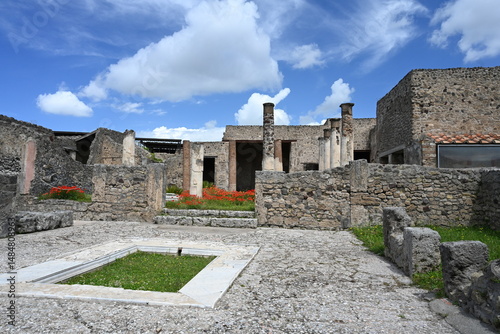 Fototapeta Naklejka Na Ścianę i Meble -  Historic streets of Ancient  roman city of Pompeii Italy on the shadow of Mt Vesuvius.Roman world, UNESCO World Heritage Site, Pompeii Archaeological Park. Italy