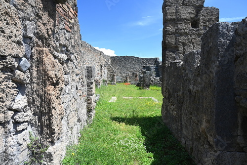 Fototapeta Naklejka Na Ścianę i Meble -  Historic streets of Ancient  roman city of Pompeii Italy on the shadow of Mt Vesuvius.Roman world, UNESCO World Heritage Site, Pompeii Archaeological Park. Italy